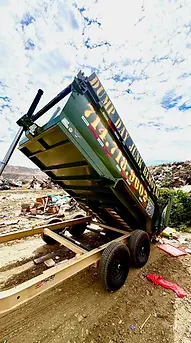 Dump Day dump trailer unloading at the disposal site