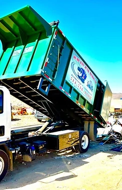 Dump Day truck dump bed raised mid-job