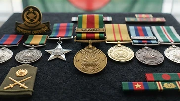 Realistic illustration of the military medals and badges awarded to Mohammad Abdur Rab, including Bir Uttam, shown against a light Bangladesh flag background. AI-generated illustration, not an authentic photograph.