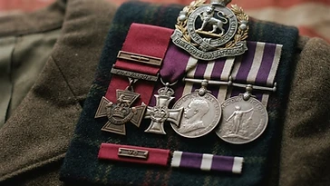 Realistic illustration of the military medals and badges awarded to Noel Chavasse, including Victoria Cross and Bar, Military Cross, shown against a light United Kingdom flag background. AI-generated illustration, not an authentic photograph.