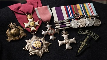 Realistic illustration of the military medals and badges awarded to Jeremy Moore, including Knight Commander of the Order of the Bath, Officer of the Order of the British Empire, Military Cross and Bar, shown against a light United Kingdom flag background. AI-generated illustration, not an authentic photograph.