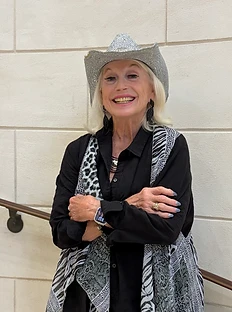 January Jones — author portrait in silver cowboy hat