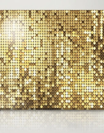 A gold sequin backdrop with a starburst light effect