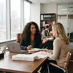 Attorney Kendra L. Rimbert consulting with a client in her office
