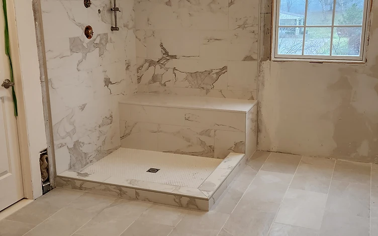 Marble Shower with Bench — luxury shower tile installation by Lotto Custom Tile