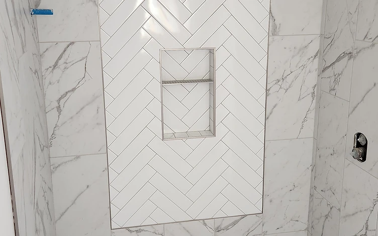 Herringbone Feature Wall — luxury shower tile installation by Lotto Custom Tile