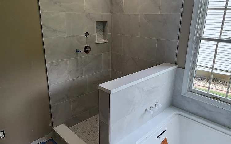 Grey Marble Shower & Tub — luxury bathroom tile installation by Lotto Custom Tile