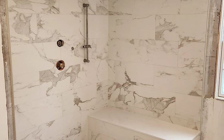 Walk-In Marble Shower — luxury shower tile installation by Lotto Custom Tile
