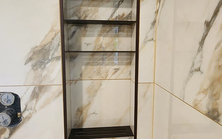 Gold-Veined Niche — luxury shower tile installation by Lotto Custom Tile