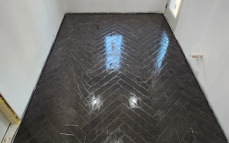 Herringbone Floor — luxury other tile installation by Lotto Custom Tile