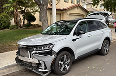 Kia Sorento front-end damage before repair, original photo supplied by Alpha Auto Collision