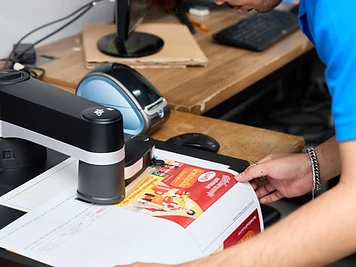 Checking print color with a measuring device