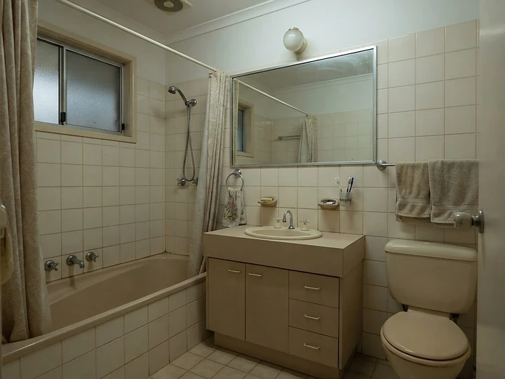 Moody Charcoal & Brass bathroom renovation — before