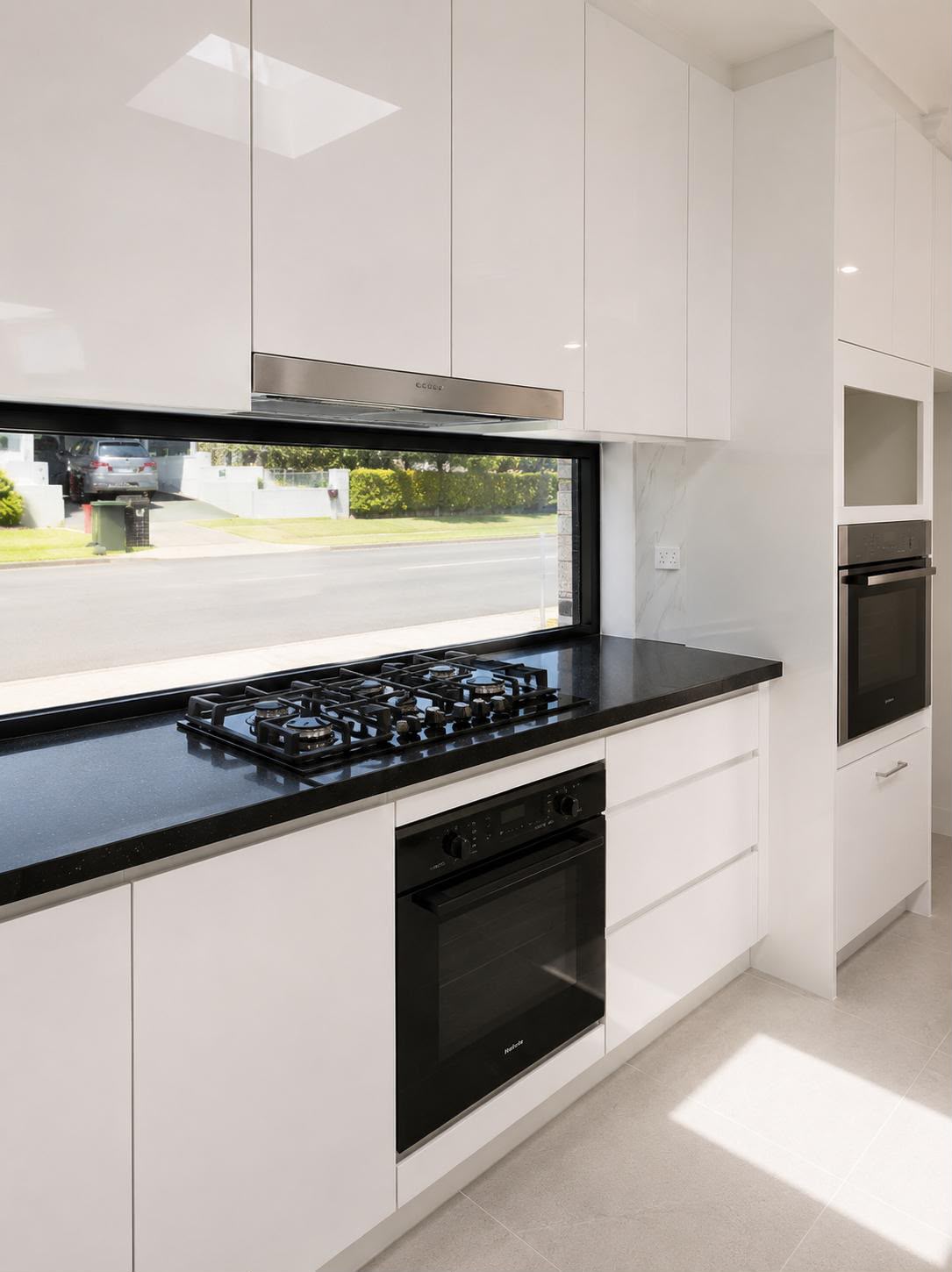 Kitchen — wheelie bin removed through window — original
