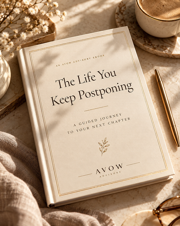 The Life You Keep Postponing, an AVOW Advisory ebook, resting on marble with a gold pen and a cup of coffee