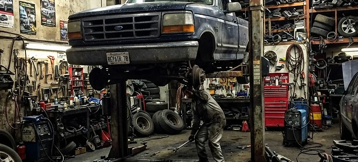 Mobile mechanic at work on a truck