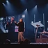 A speaker sharing a message at a past Wave Church gathering