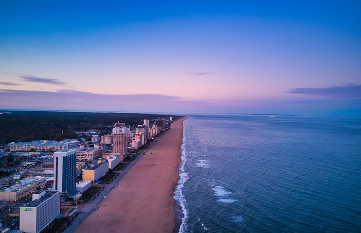 Aerial view of the Virginia Beach coastline at twilight