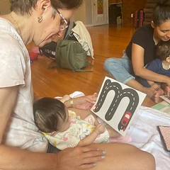 Letter m — road tracing with baby