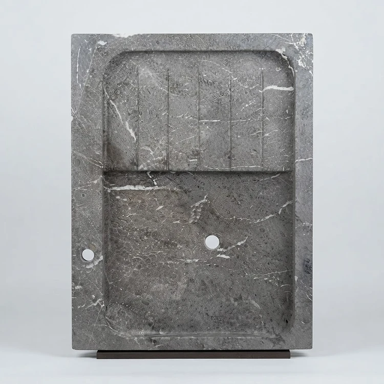 Lavabo artesanal de mármol fosilífero