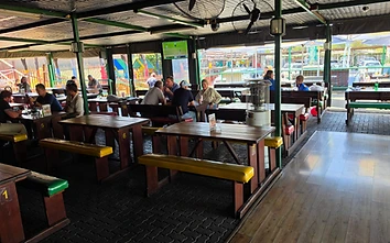 Covered beer garden with bench seating