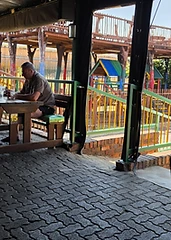 Family seating with the kids' playground