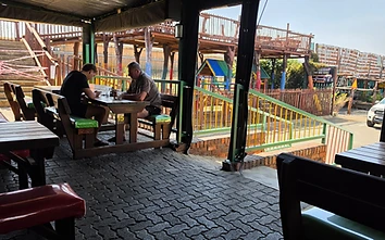 Family seating with the kids' playground