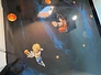 Sol résine personnalisée après travaux — motif Dragon Ball Z sous finition brillante