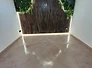 Mur en Mortex effet bois avec végétal stabilisé et éclairage LED intégré