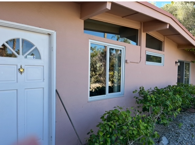 Desert home exterior with custom clerestory and sliding glass windows installed in the Coachella Valley