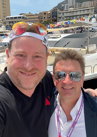 Allan McNish taking a selfie with a guest in the Monaco marina