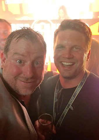 Stuart Meaker taking a selfie with a guest at a Berkeley Red event