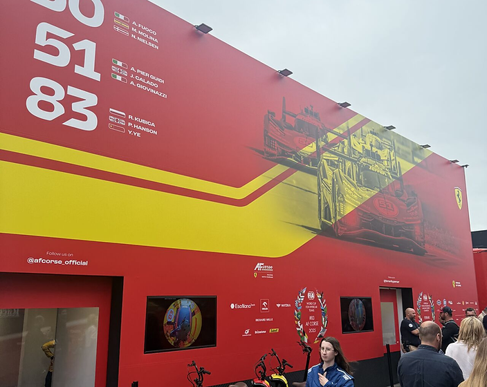 AF Corse Ferrari team display wall in the Le Mans paddock