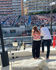 Guests watching the race from a private trackside balcony