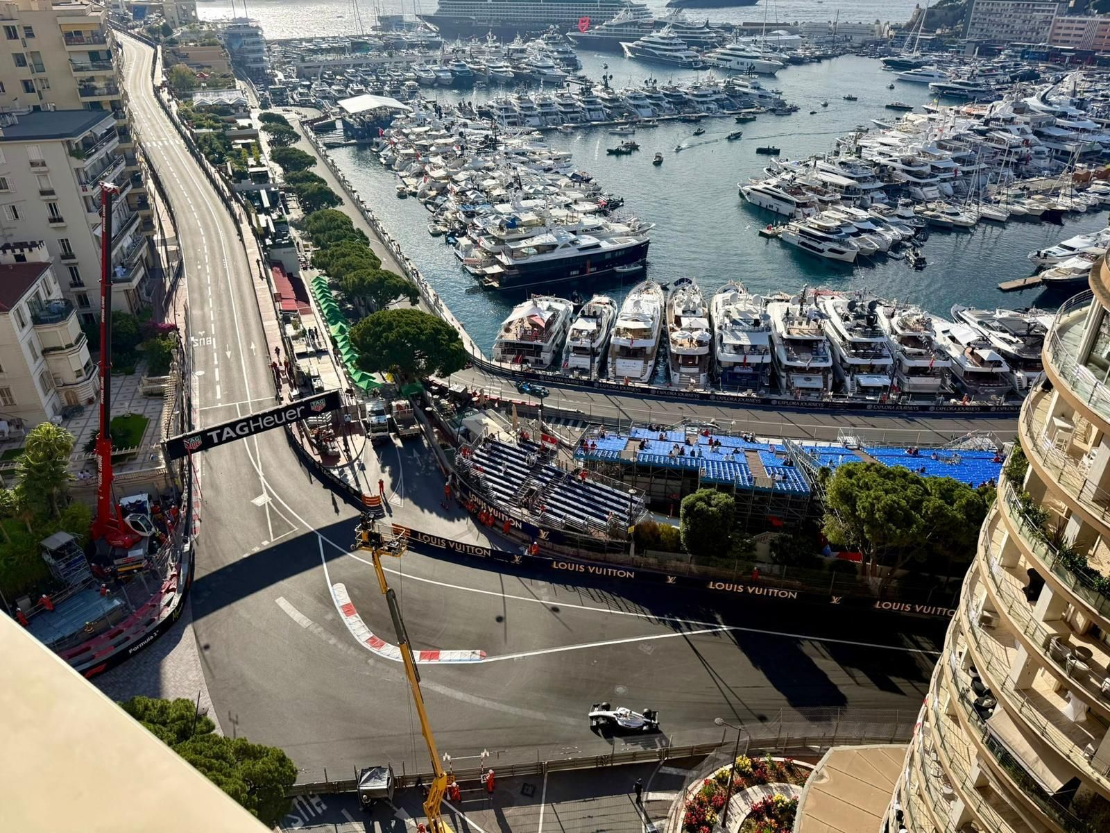 Aerial view of the Monaco Grand Prix circuit and Port Hercule packed with superyachts