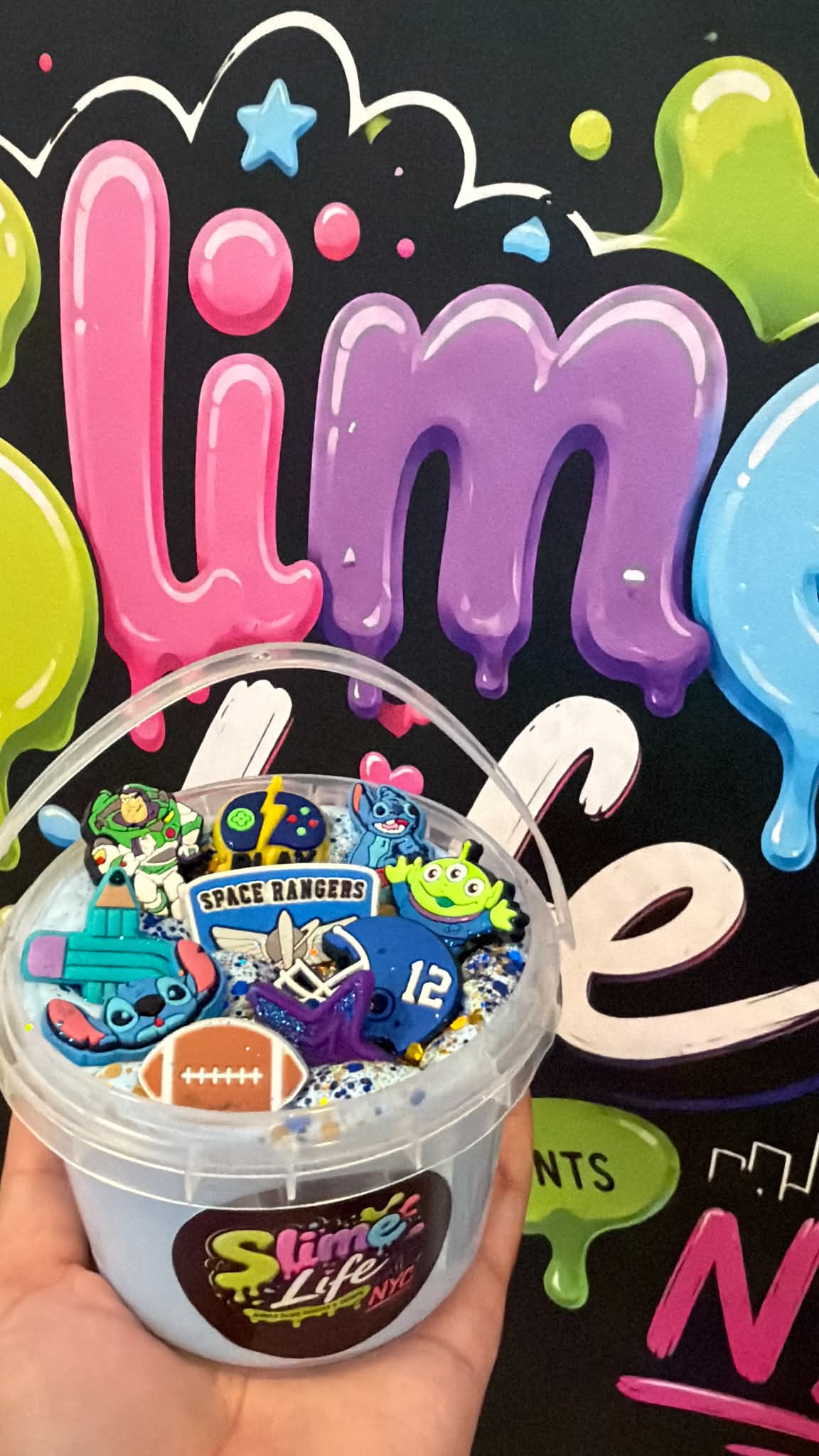 Slime Life NYC bucket of slime with themed charms
