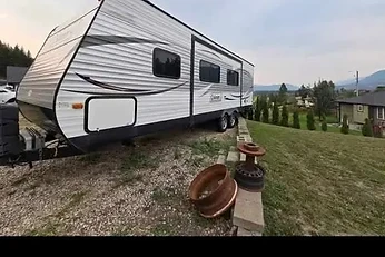 2017 Coleman 26 foot Bunkhouse travel trailer with driver-side slide-out