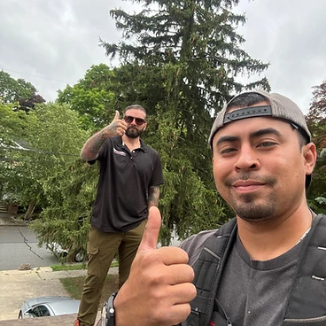 Veterans Roofing team on roof