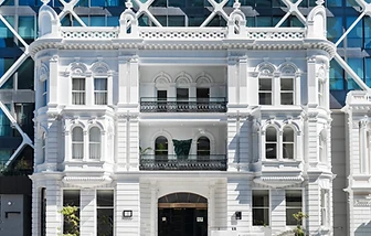 The International, 9 Princes Street, Auckland — the white heritage frontage at street level