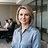 AI-generated portrait representing Lena Kowalski (AI Analyst, not a real person)