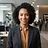 AI-generated portrait representing Grace Osei (AI Analyst, not a real person)