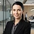 AI-generated portrait representing Stella Novak (AI Analyst, not a real person)