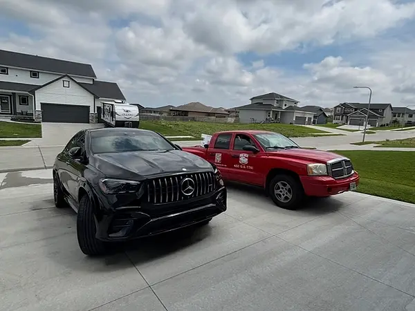Black Mercedes SUV — Big Red on site