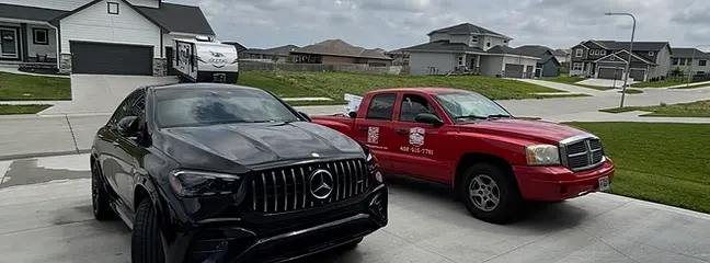 Black Mercedes SUV — Big Red on site