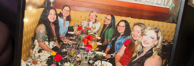 Mothers from The Post Care gathered together at a community dinner