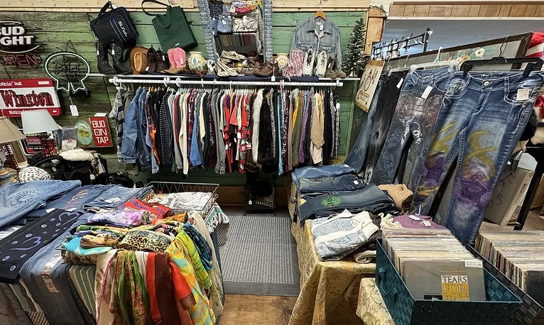 Vintage clothing, vinyl records, and consignment finds in the market