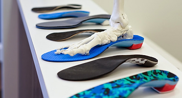 sport orthotic in a skate or boot
