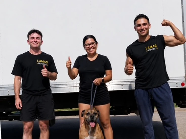 The Lamas Moving team in front of their truck