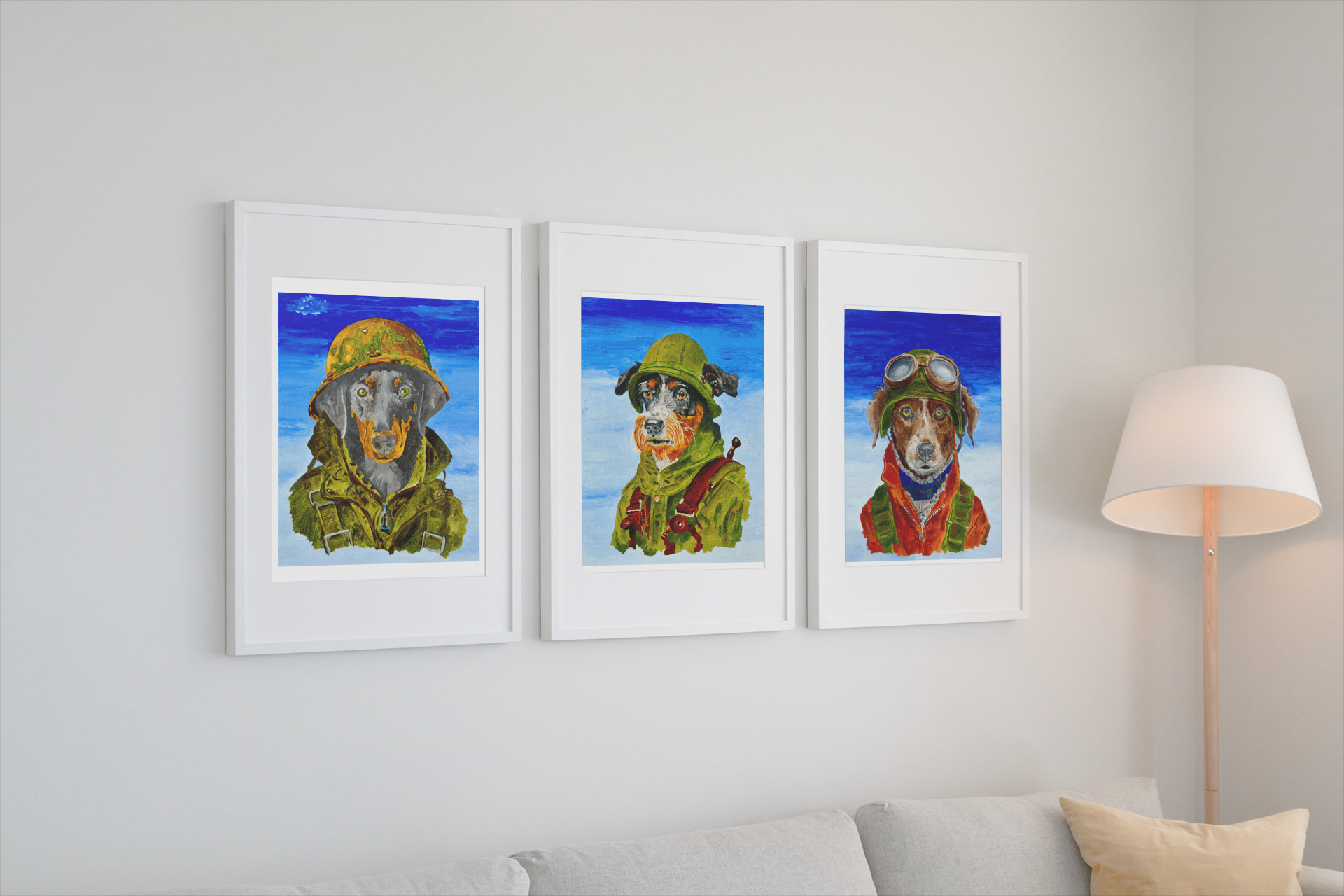 The Aviator — three framed dog paintings hanging above a sofa in a living room