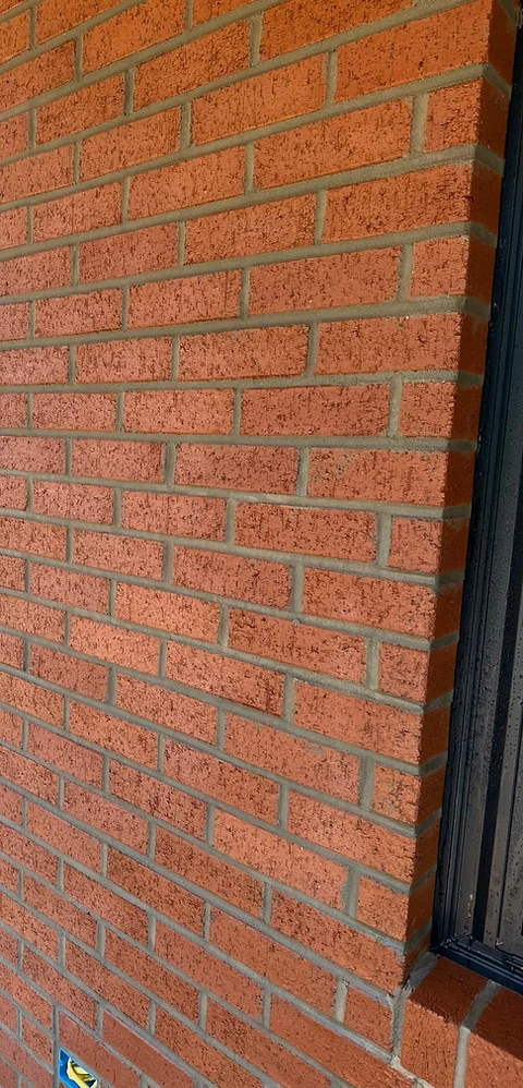Red brick pillar under construction